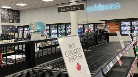 Buy Canadian sign in liquor store