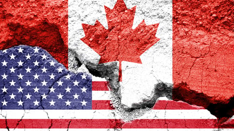 Concrete Canadian and American flags