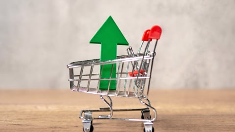 shopping cart with upward arrow