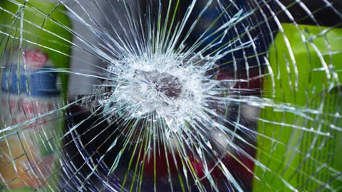 bullet hole in window