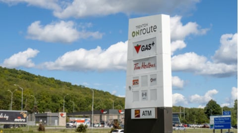 The roadside sign with gas price and other amenities at the typical Trenton On Route Highway 401 rest stop