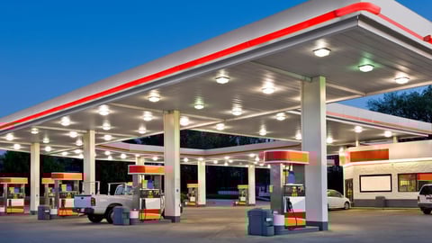 Gas Station Forecourt at night with pumps