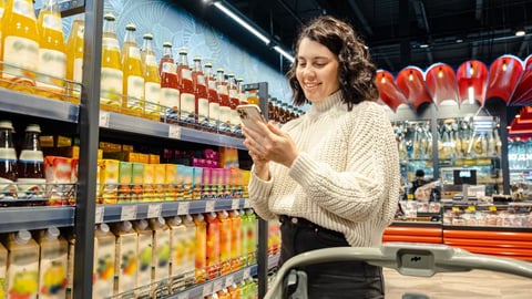 Woman Shopping with a handheld device