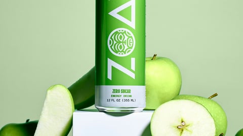 ZOA Green Apple flavour in a can surrounded by green apples