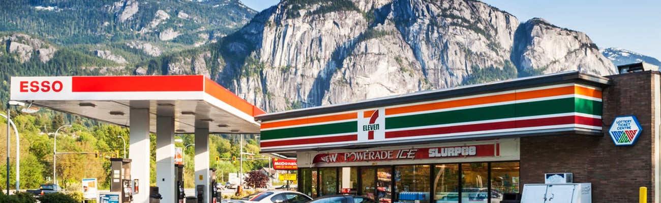 SQUAMISH, CANADA - MAY 12, 2007: 7-Eleven store and Esso gas station on Cleveland Avenue. 7-Eleven is largest operator and franchisor of convenience stores in the world with more than 50,000 outlets.