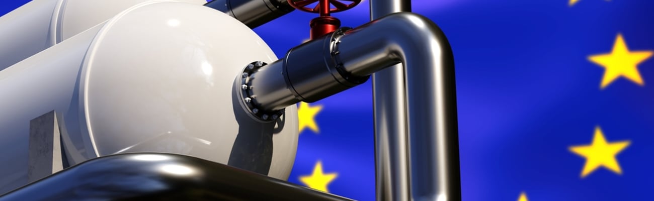 Gas industry. Gas supplies to European Union. EU symbol with fuel equipment. Supply of liquefied natural gas to Europe. Concept importing energy resources to Europe. Blurred EU flag. 3d image