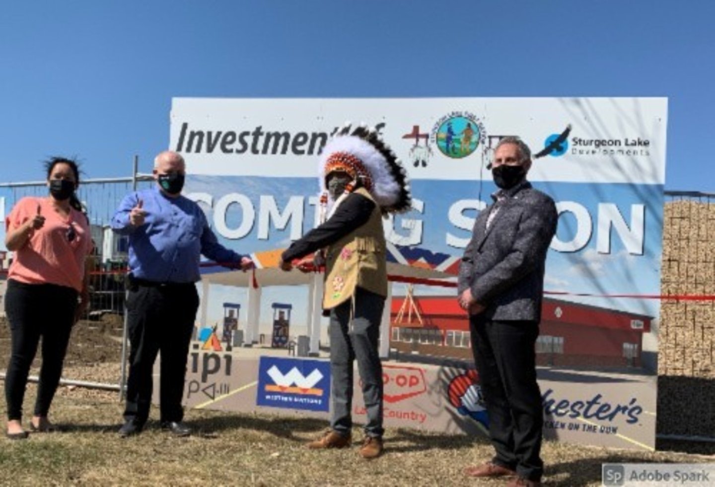 handshaking at Western Nations ground breaking ceremony