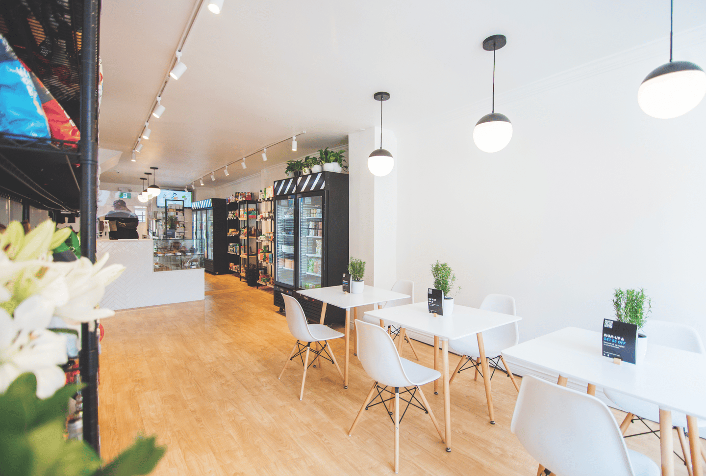 The store has a seating area where people can enjoy lunch or breakfast items.