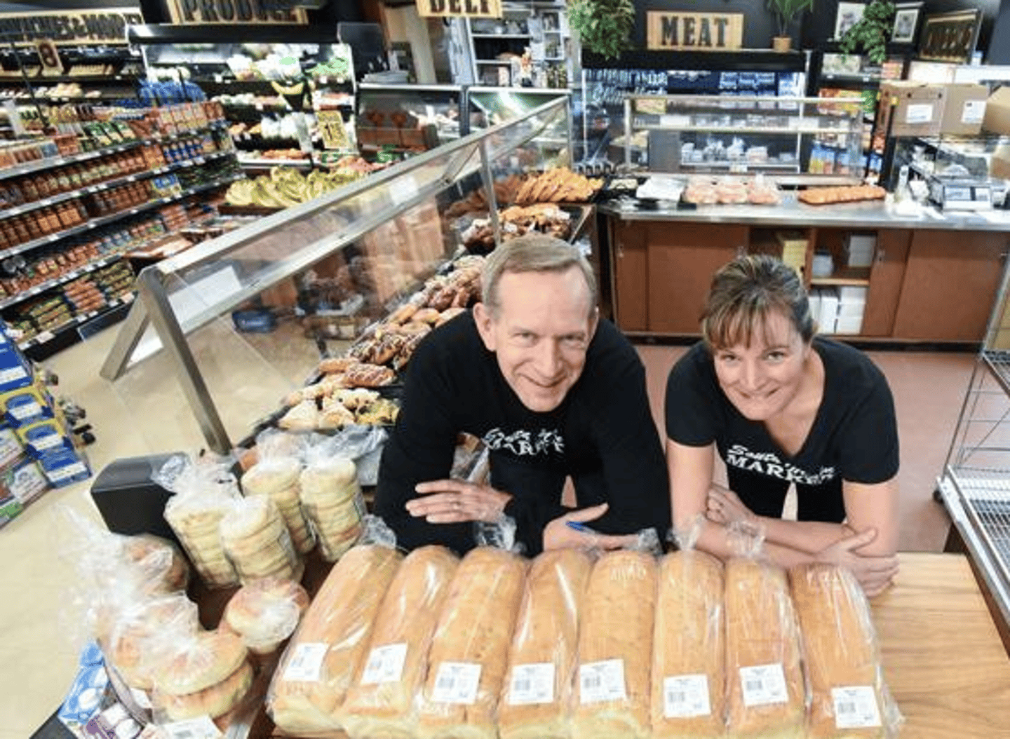 Dan and Tracy Fehr pose with freshly made bread. 