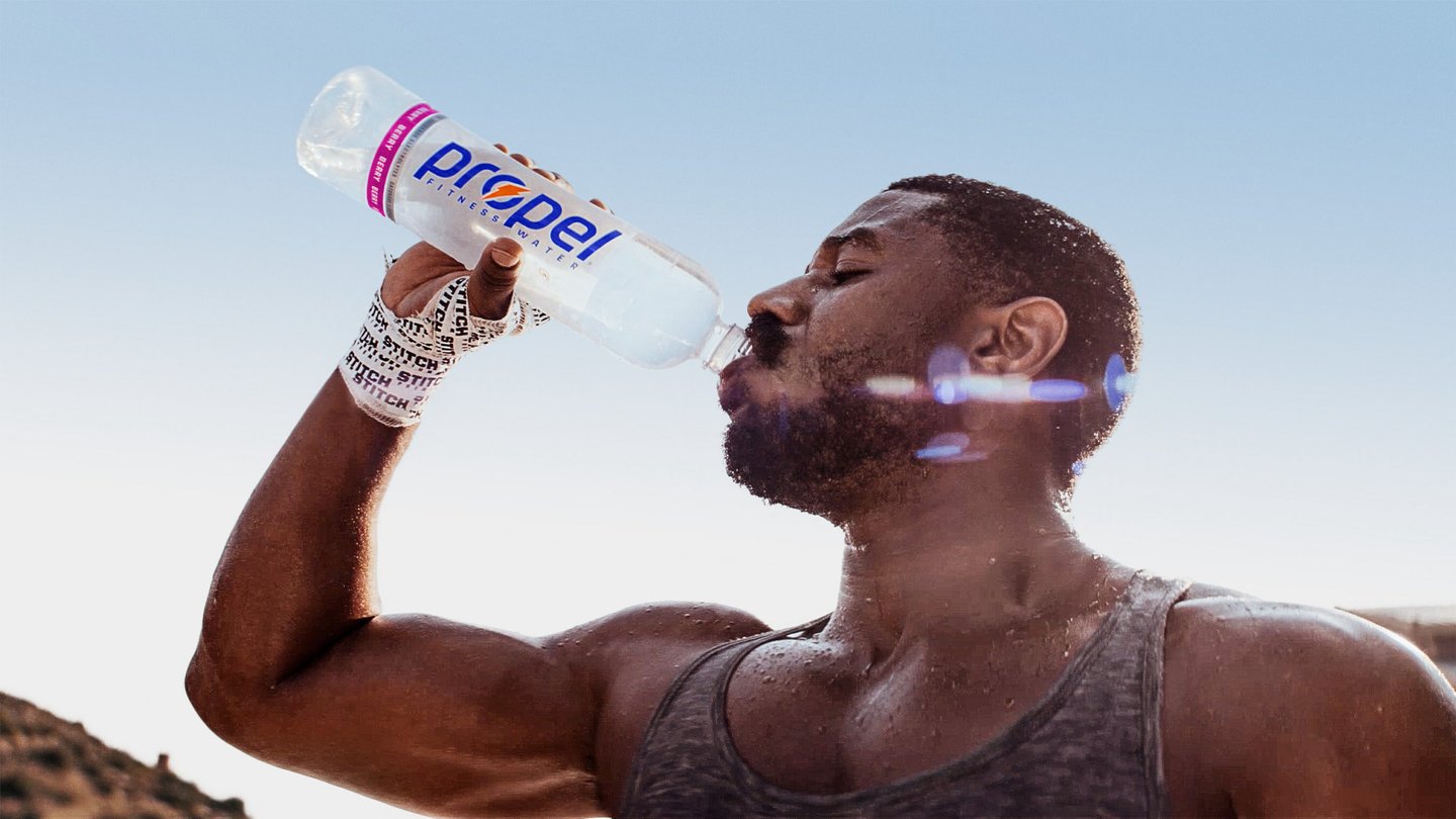 Michael B Jordan drinking Propel water