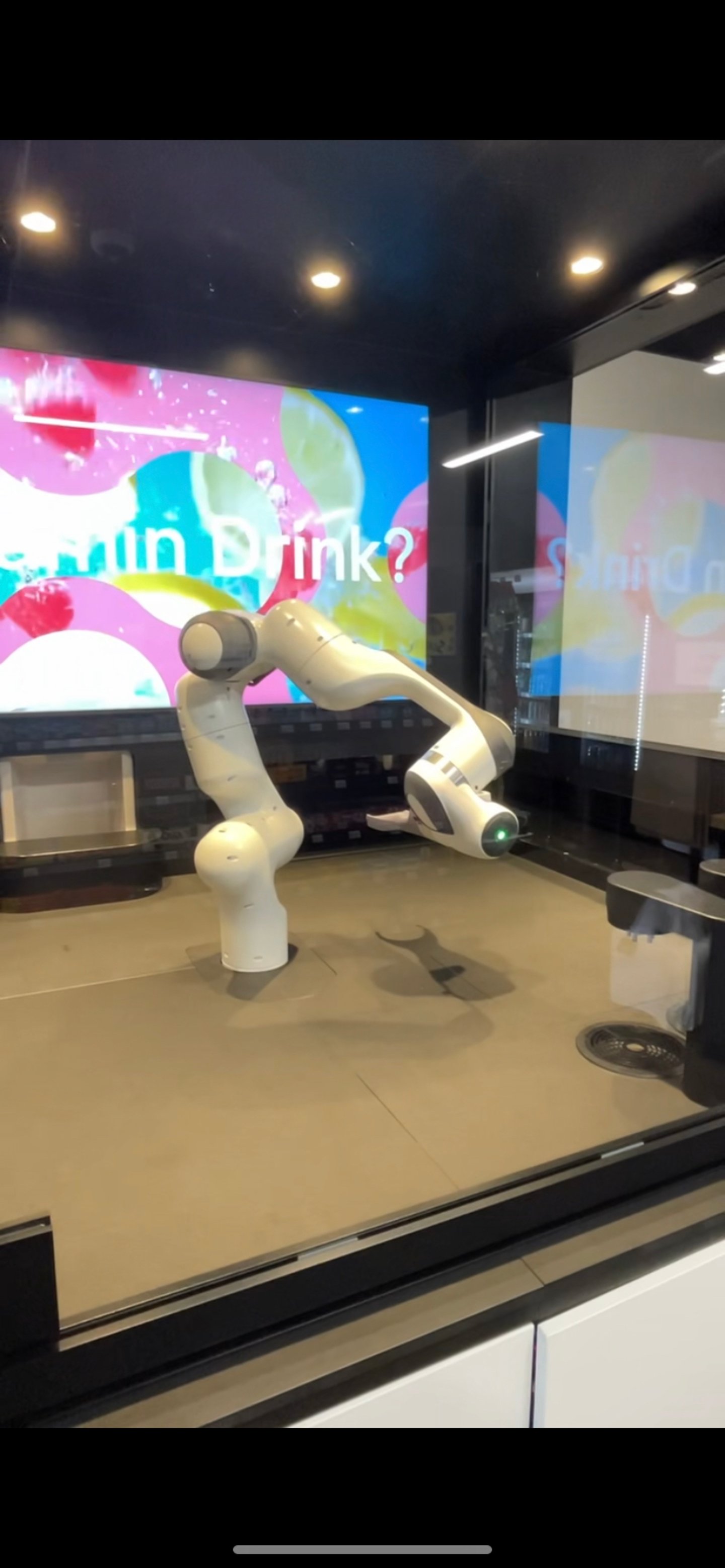 Smyze robotic arm making coffee