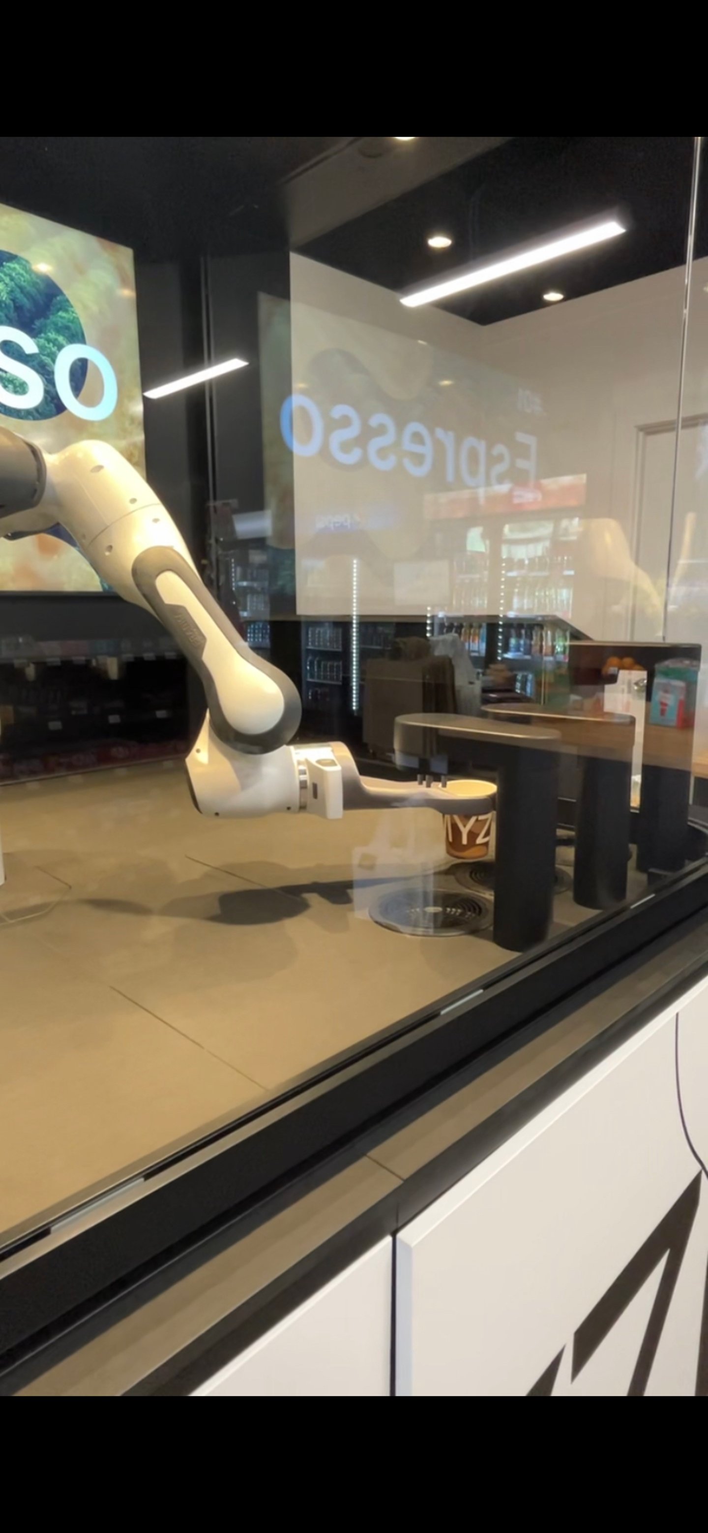 Robot arm making coffee at Vendor Convenience