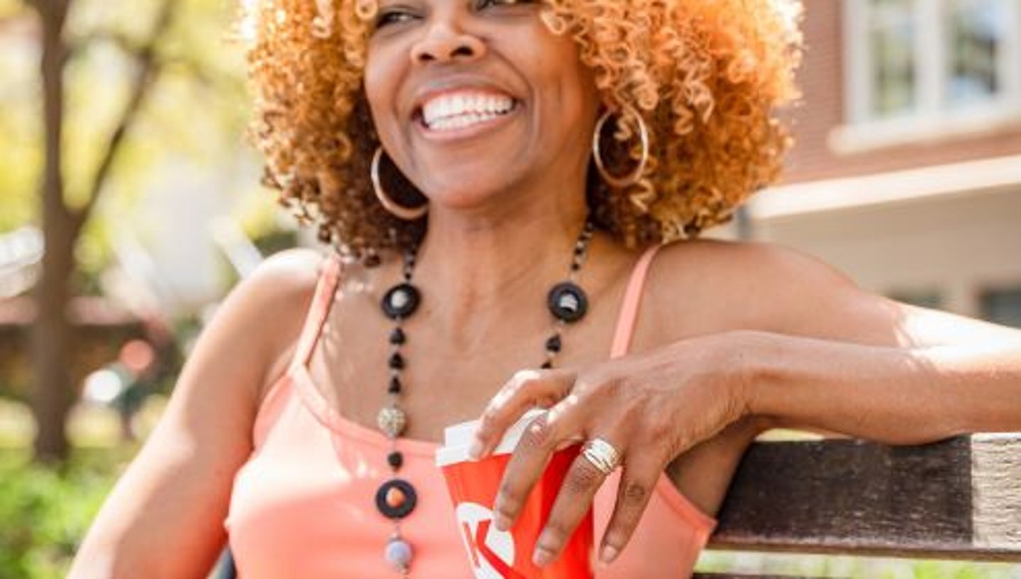 Woman drinking a Circle K coffee