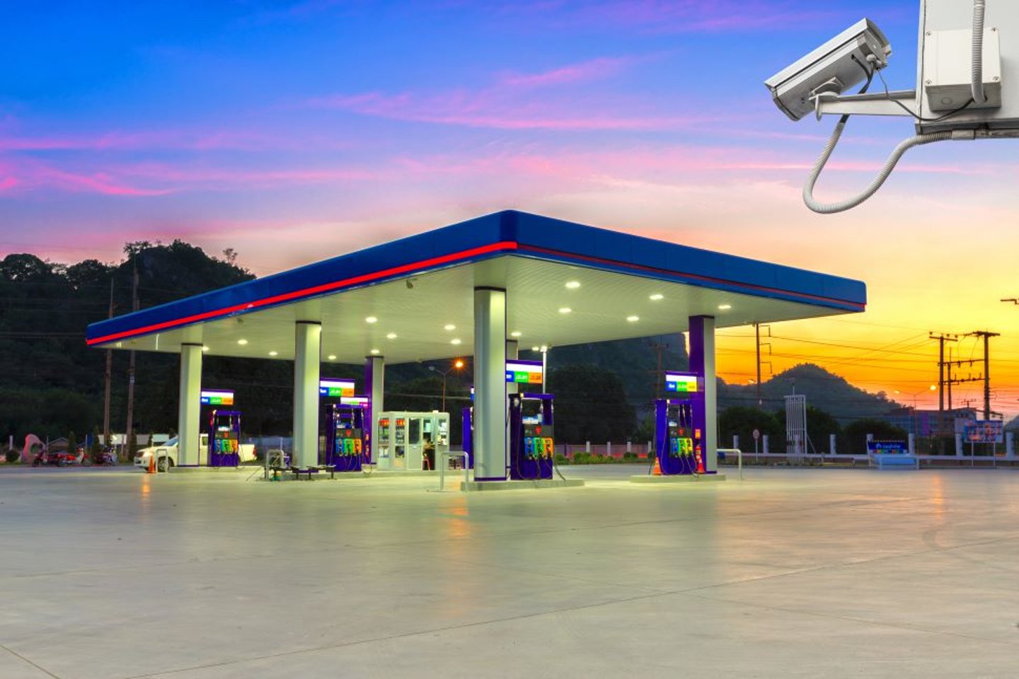 Gas Station Exterior with Security Camera