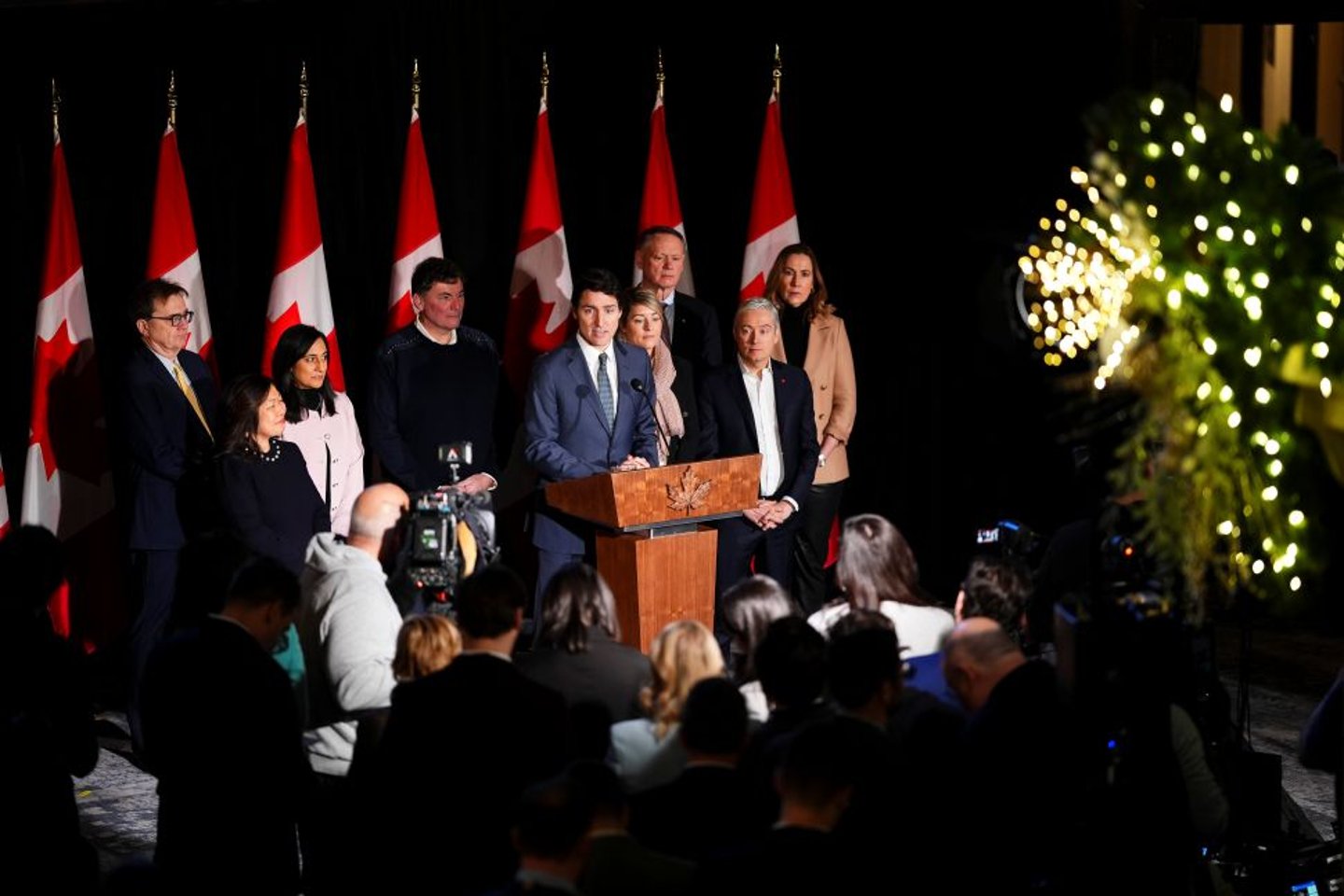 Prime Minister Justin Trudeau stands with members of his cabinet 