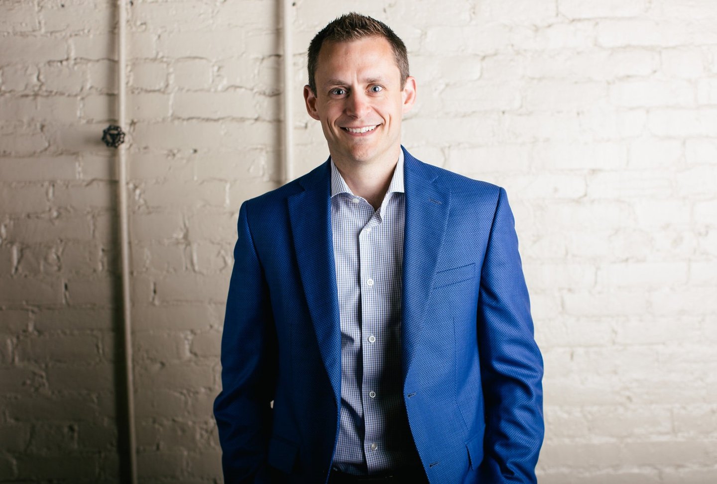Trevor Grant in a blue suit
