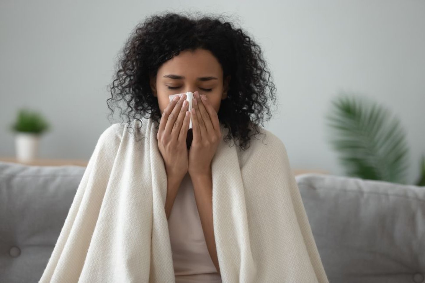 Woman suffering from the flu stock image