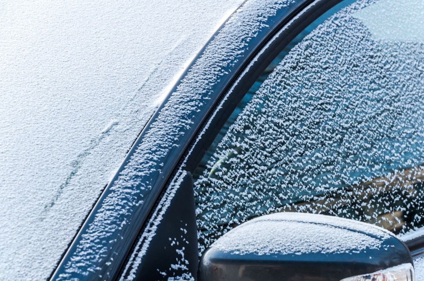 Snow covered car stock image