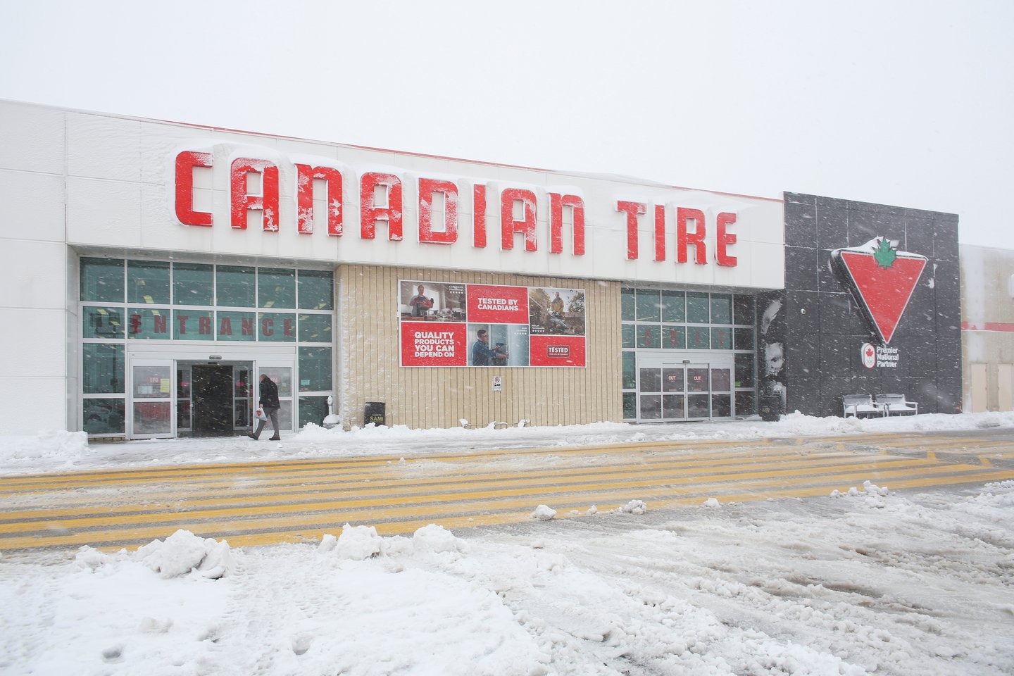 Canadian Tire store with snow on sign and snow in foreground