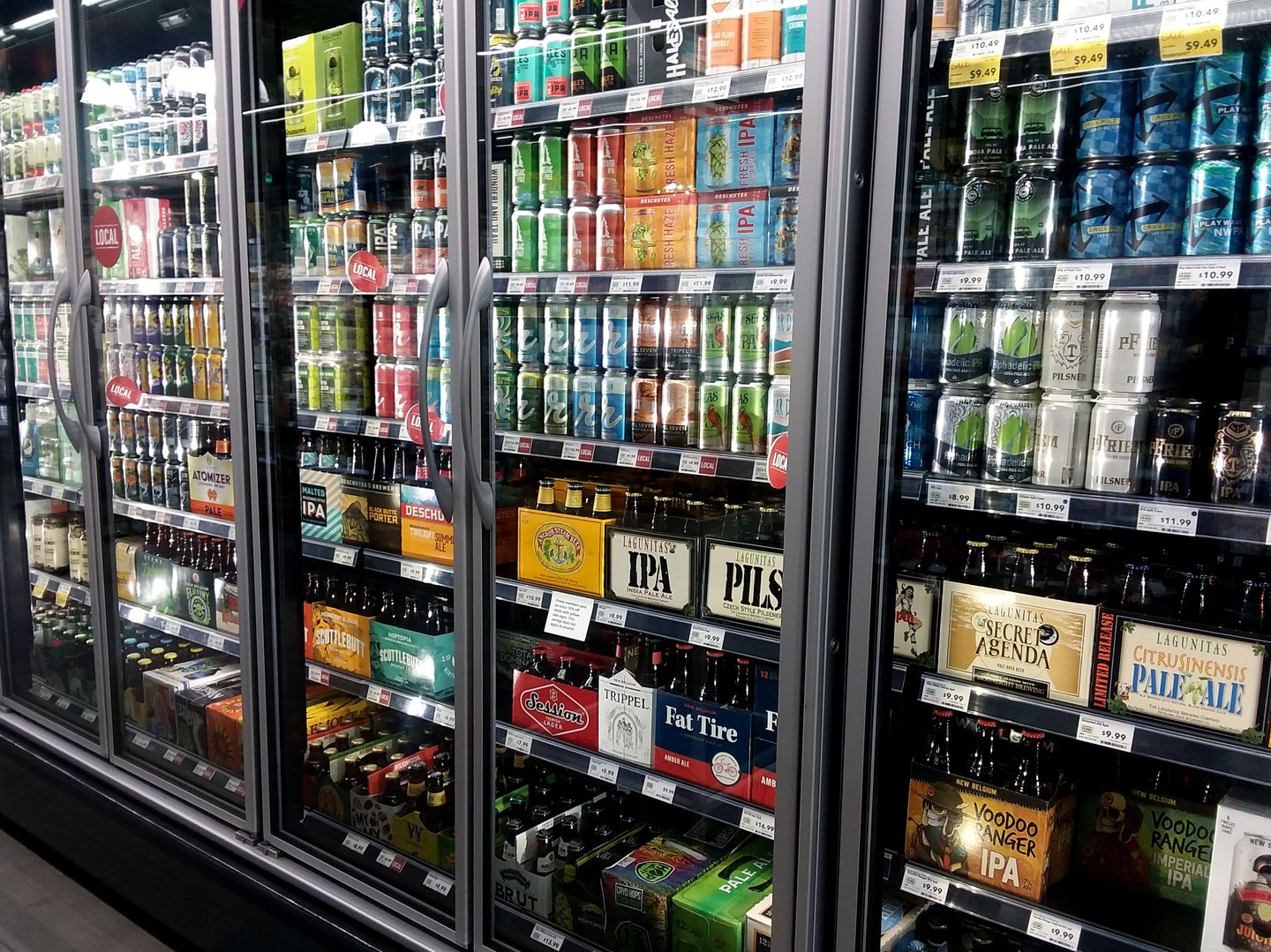 Refrigerated cases of store with ready-to-drink products and beer