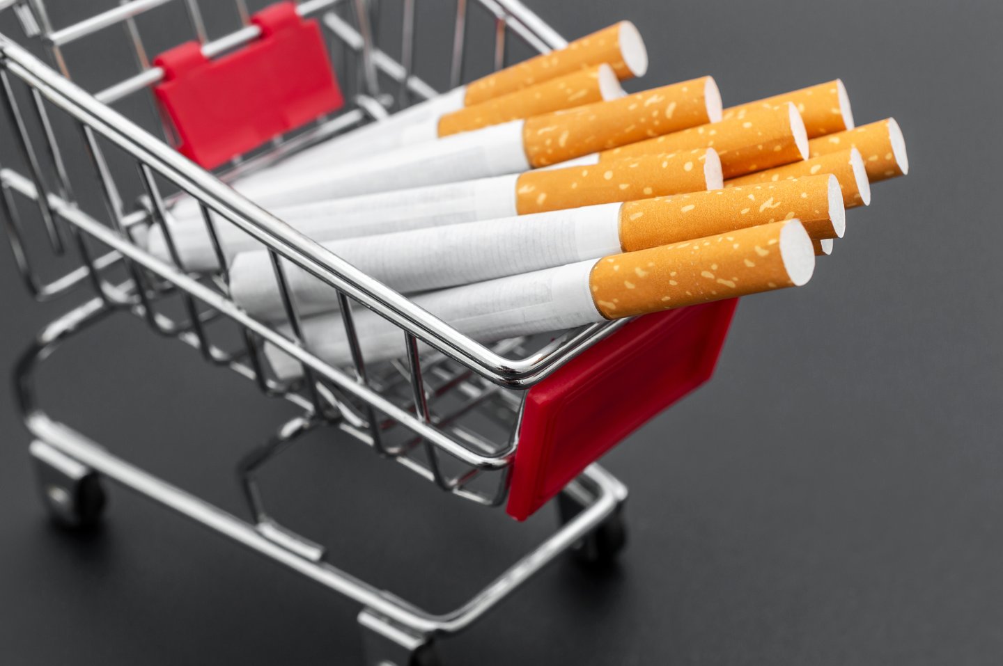 cigarettes, oversized, in a shopping cart