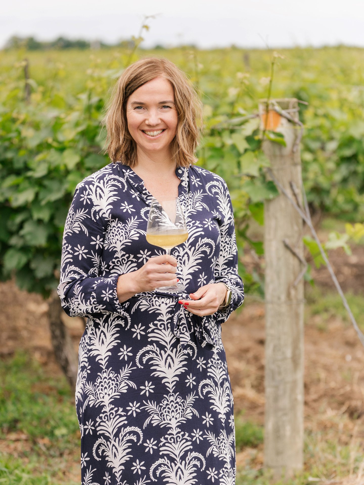 Courtney Henderson in vineyard