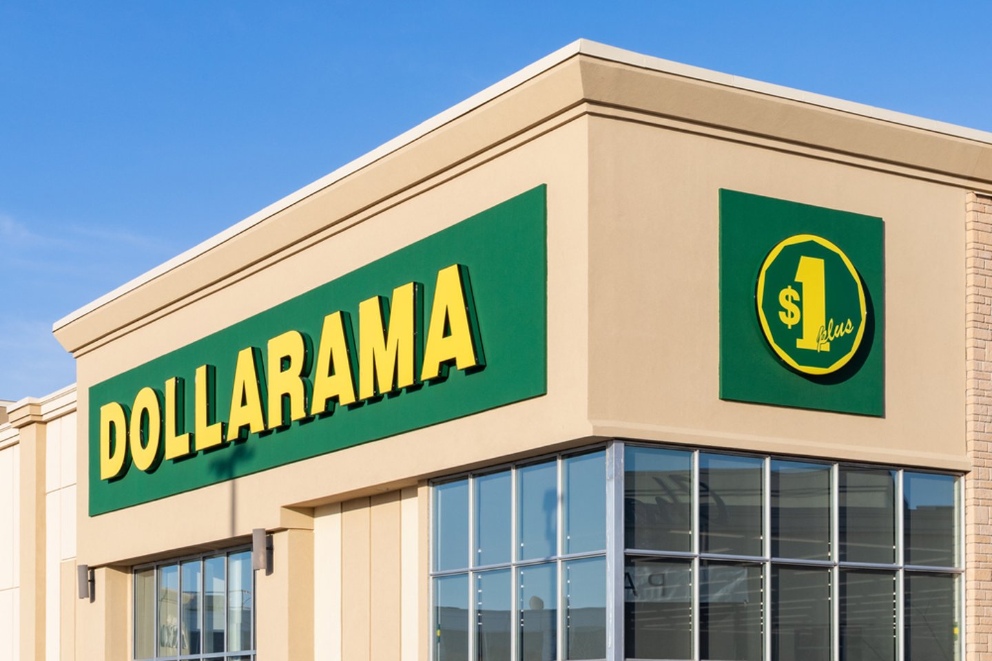 Outside corner of Dollarama store, logos visible from front and sides
