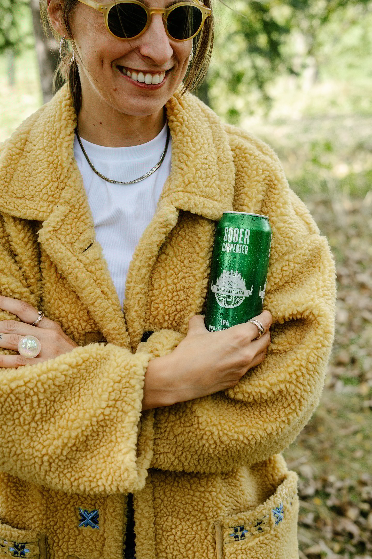 Martine Allard holding can of low-alcohol beverage
