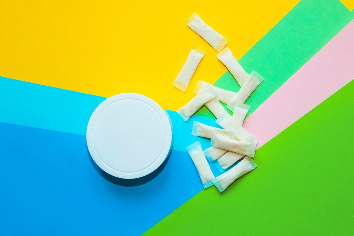 Nicotine Pouch against a colourful background