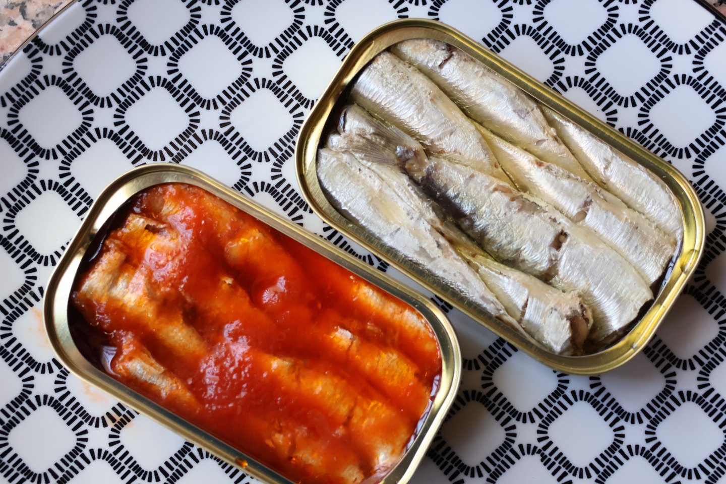two kinds of sardines in cans