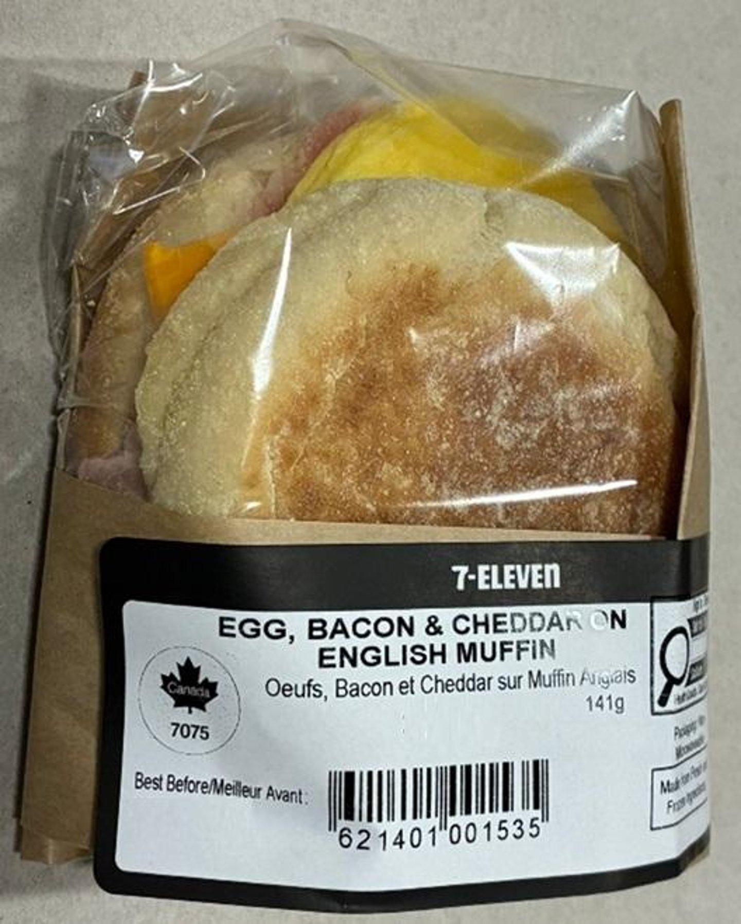 A prepared egg, bacon & cheddar english muffin from 7-Eleven.