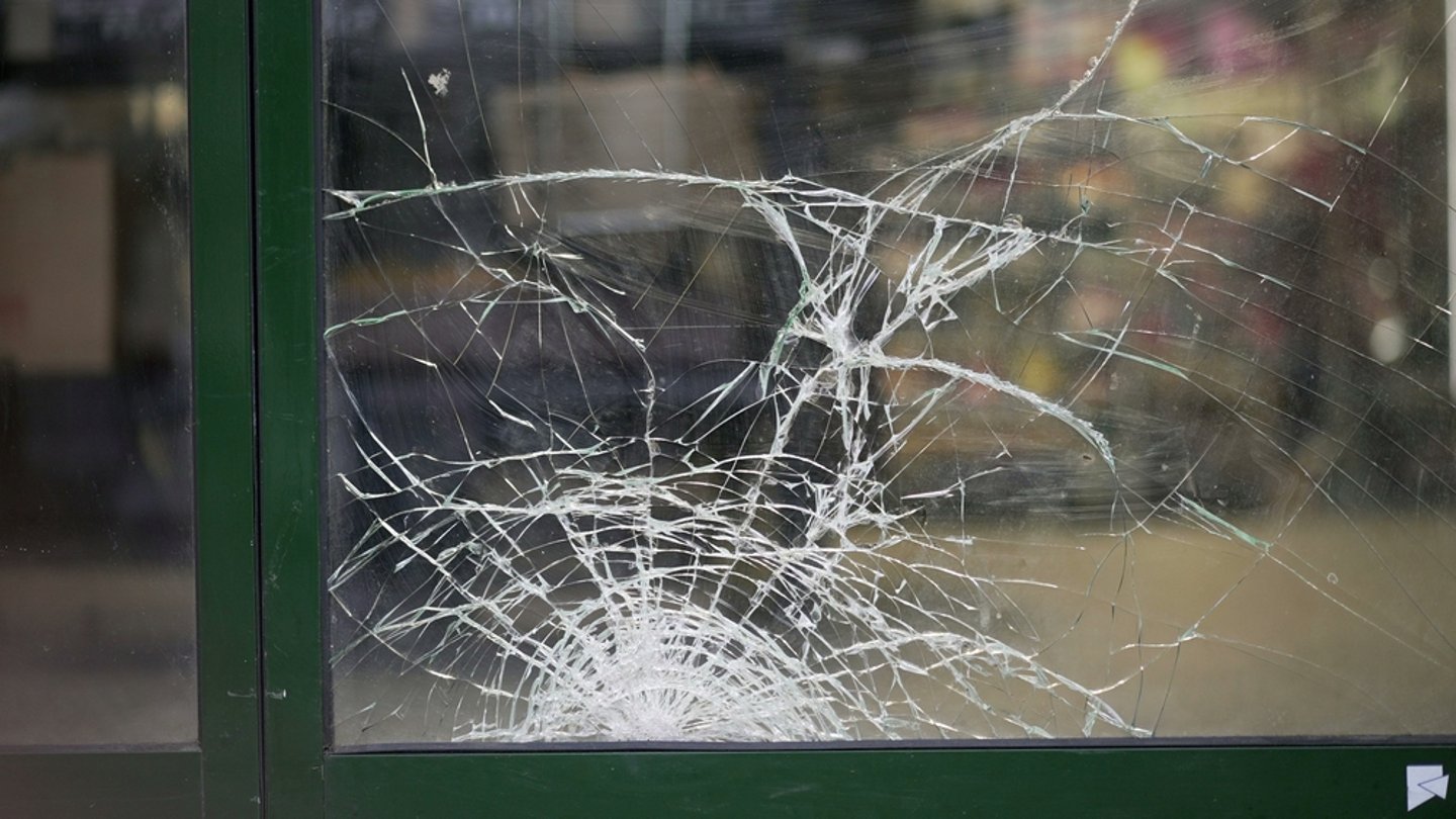 Close up of a shattered store window