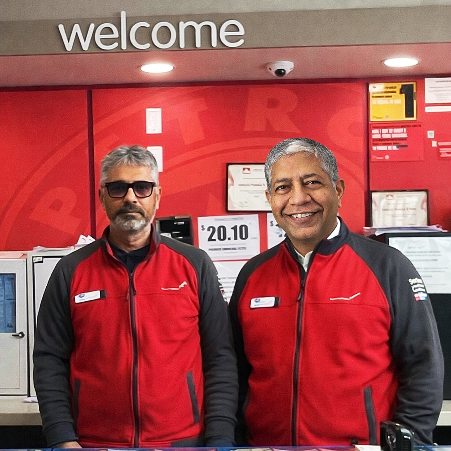Udayan Pandya and Ketan Dave in front of their counter at the Green Mountain Petro-Canada