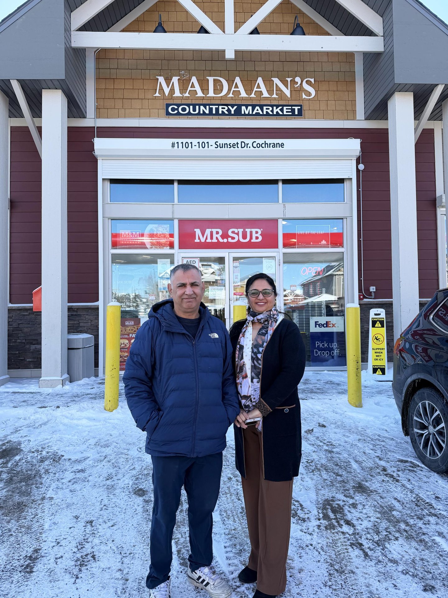  Neelam Madan and Anil Madan in front of their store, Madaan's Country Market