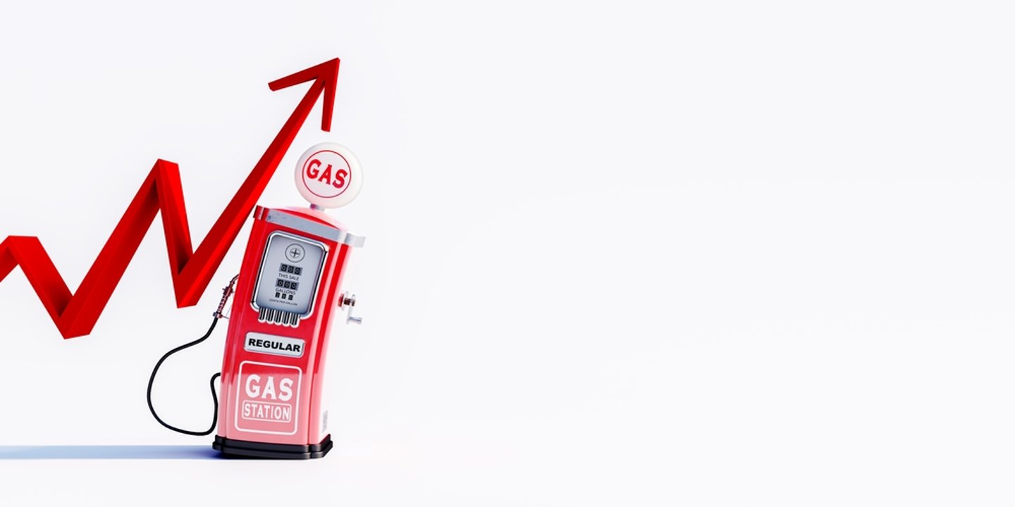 rising arrow next to a fuel pump