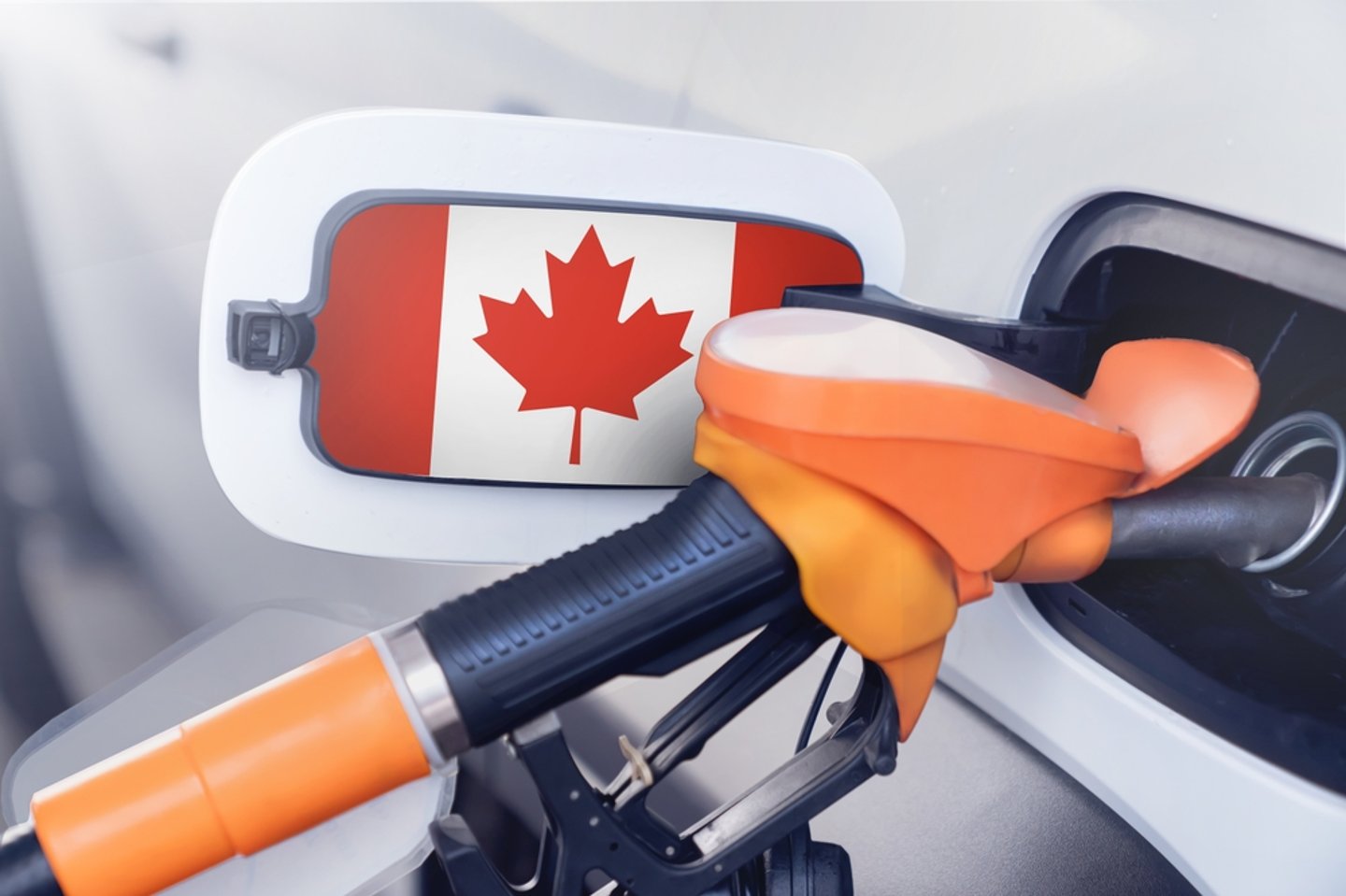 fuel pump and canadian flag in rearview mirror