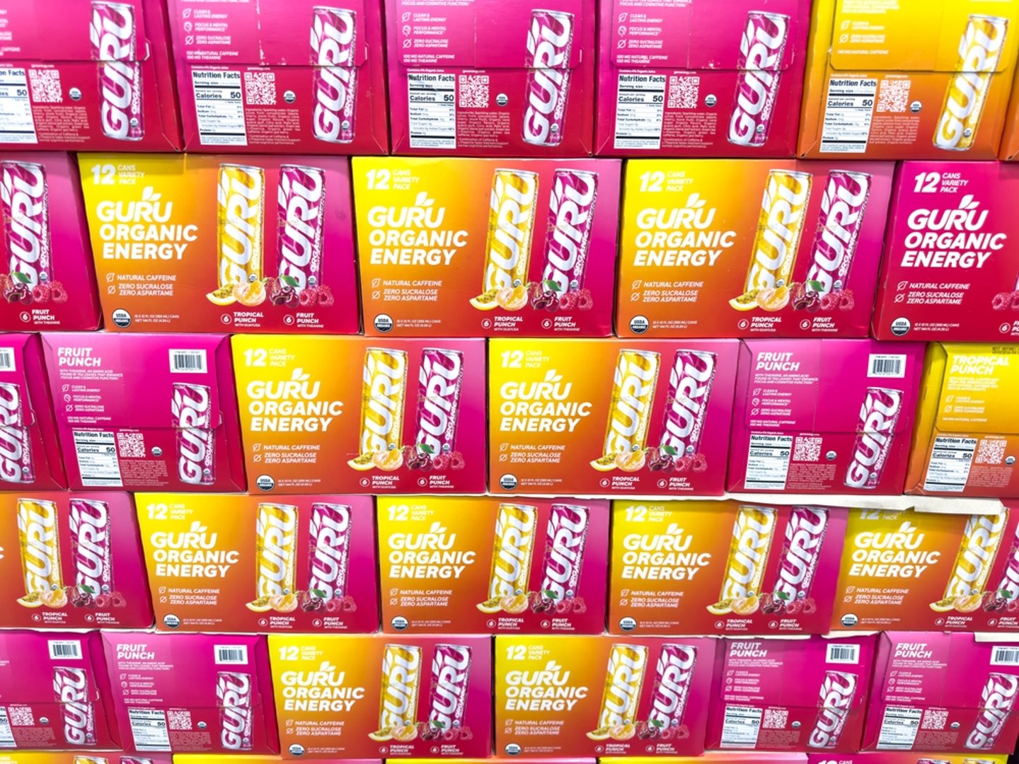 stacked cases of Guru Energy drinks