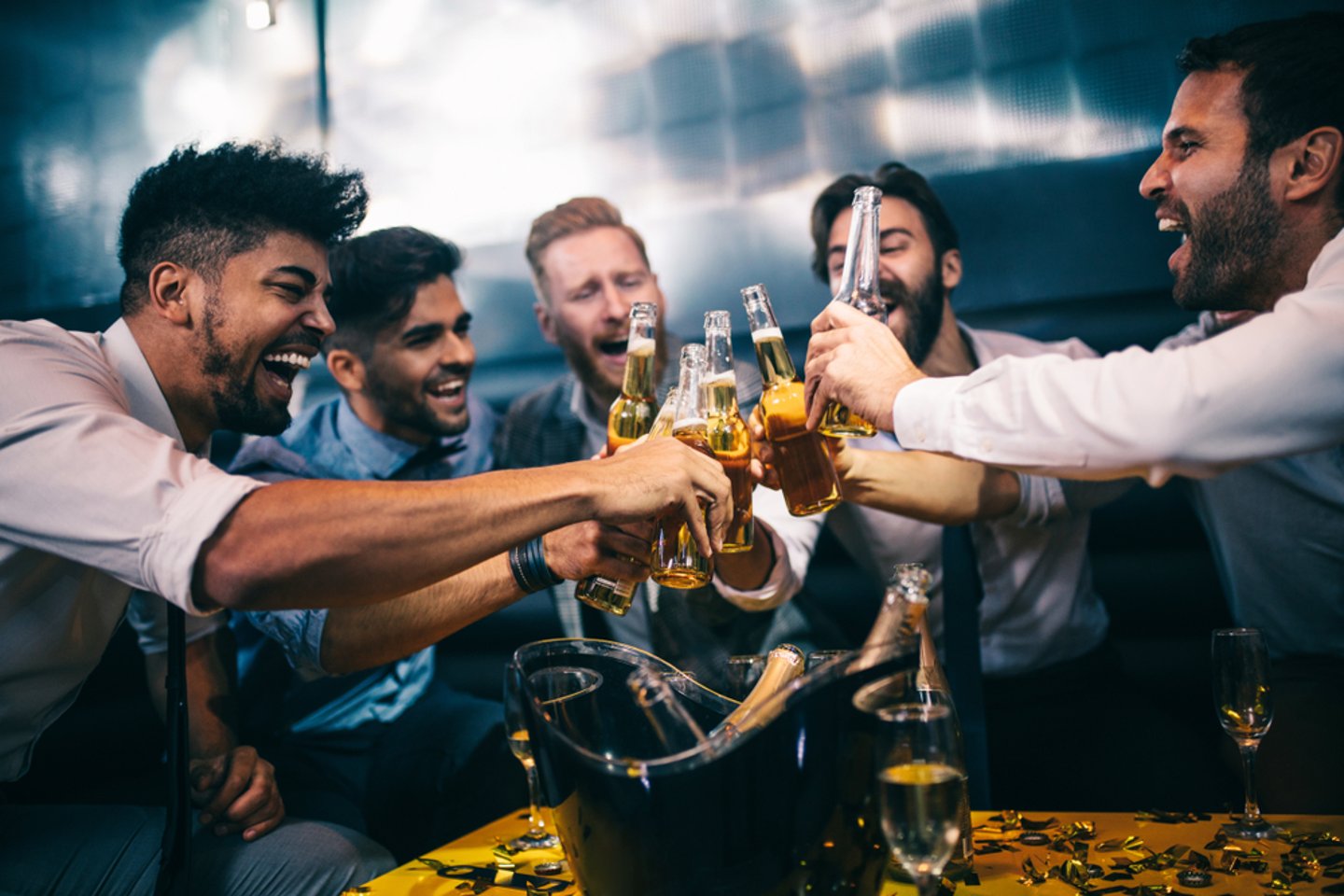men drinking in a pub