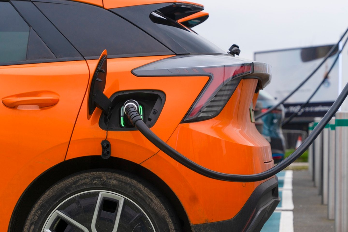 Electric car being charged