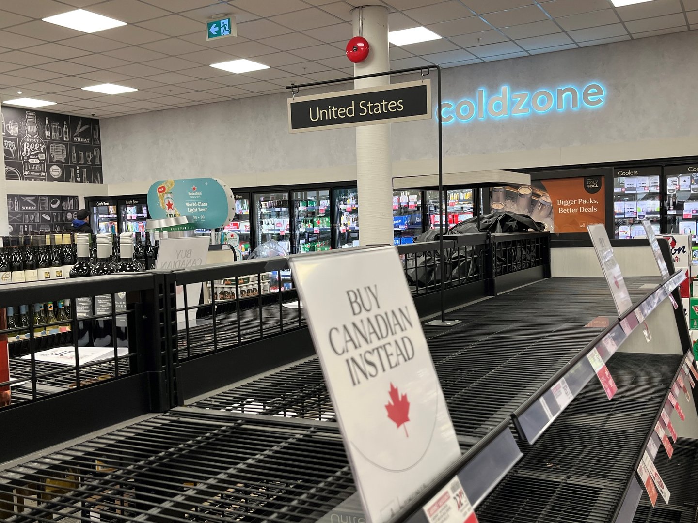 Buy Canadian sign in liquor store