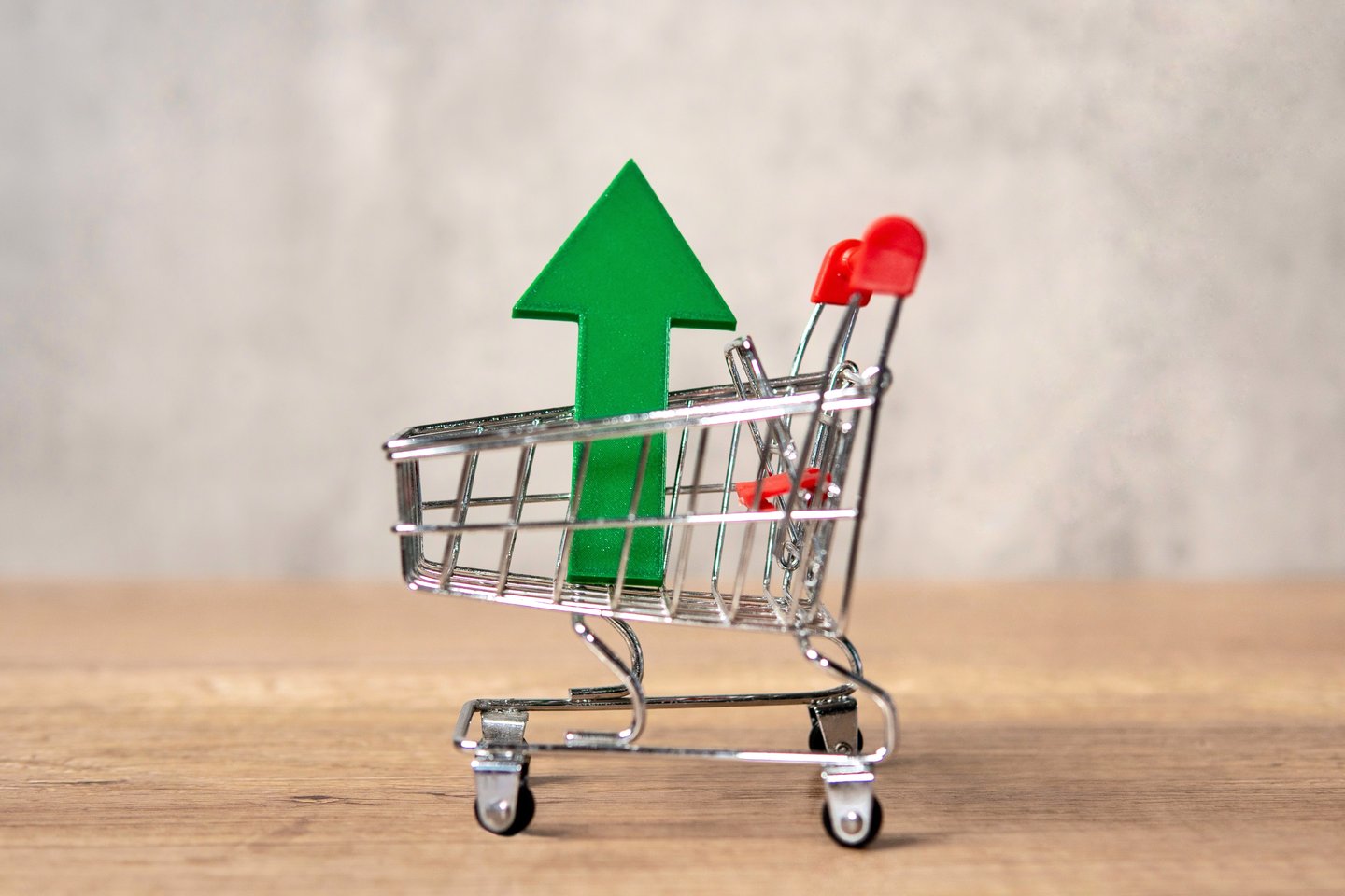 shopping cart with upward arrow