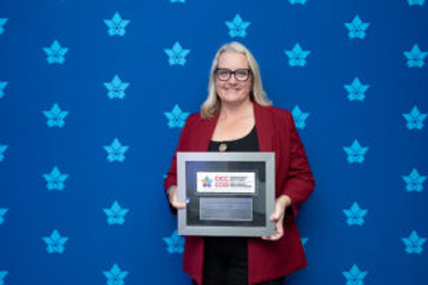 Kory McDonald and CICC Outstanding Industry Leader award