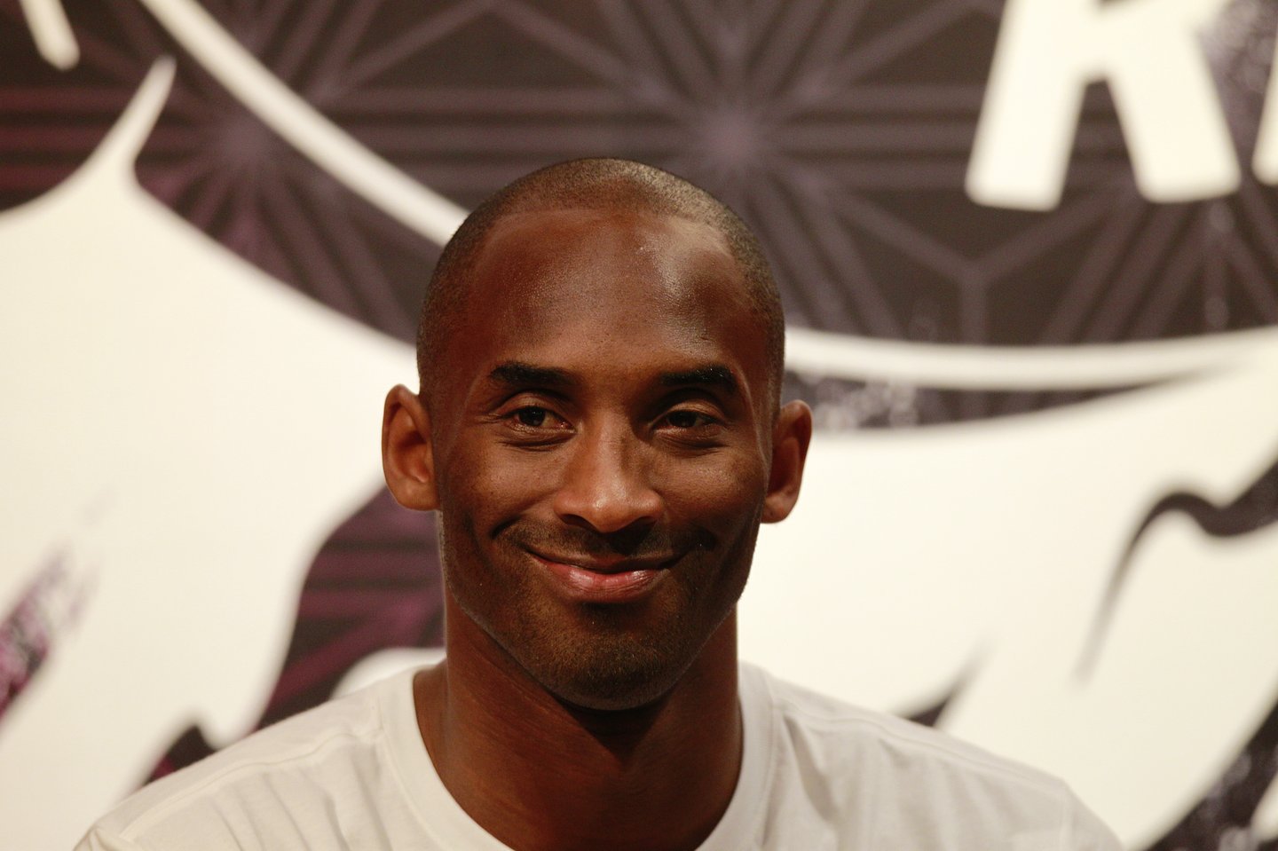 Head shot of Kobe Bryant smiling