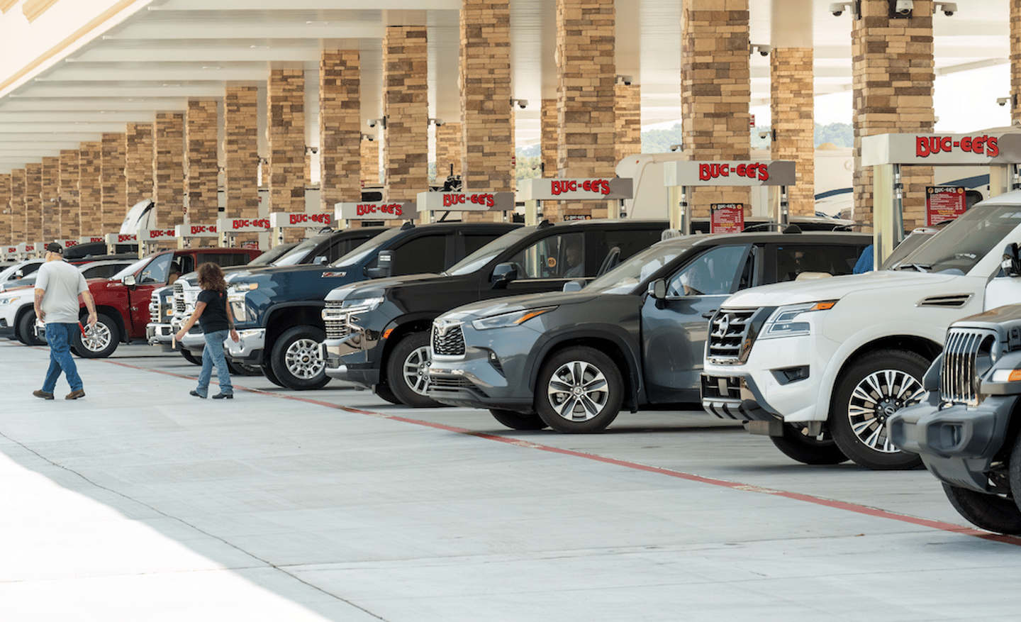 Sevierville, Tennessee, United States – July 24, 2023: A steady line of vehicles fuel up at a newly opened Buc-ees.