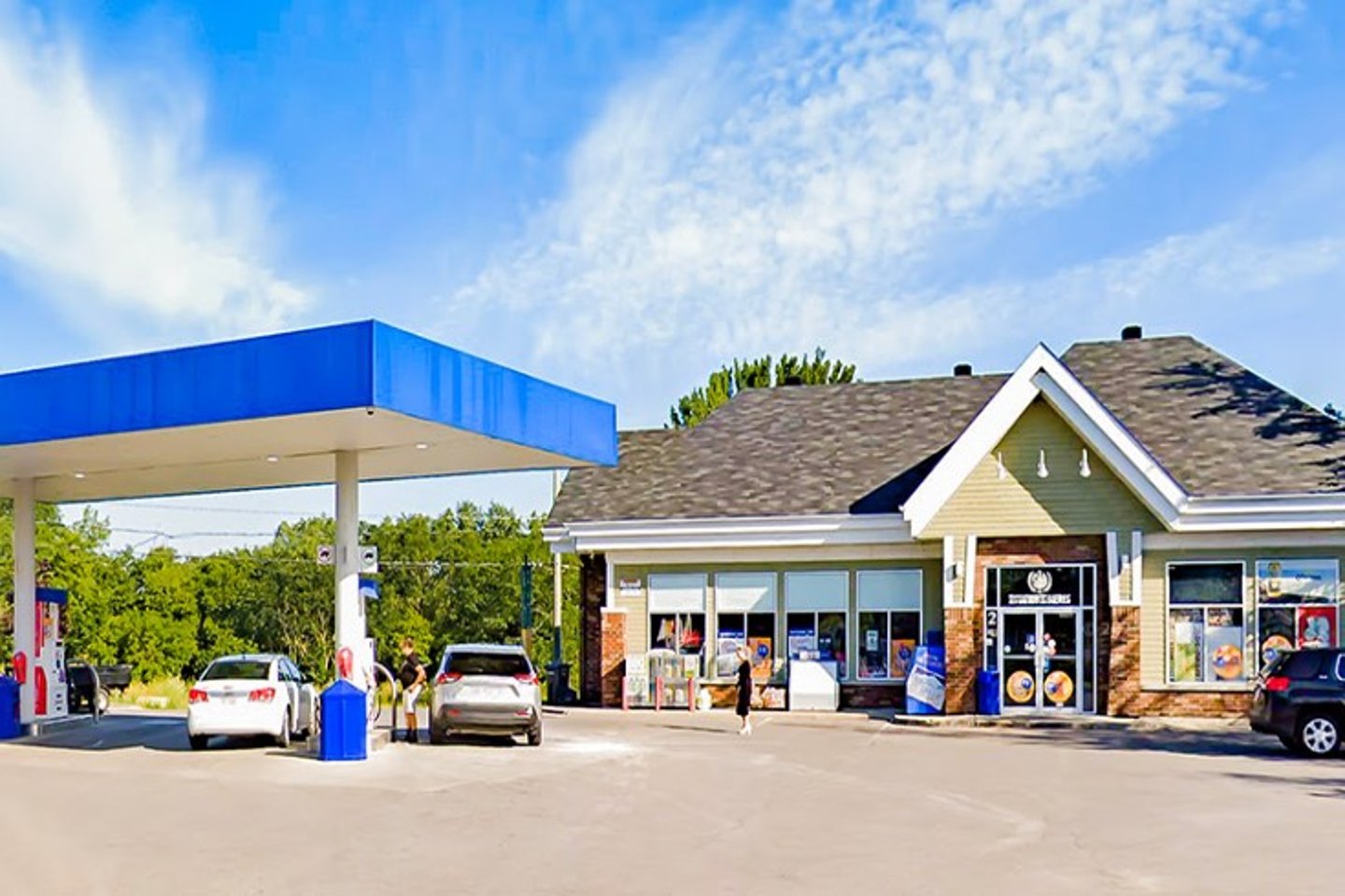 Stock image of gas station with convenience store 