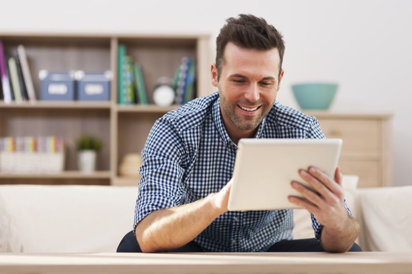 Stock Image of a man shopping with a tablet