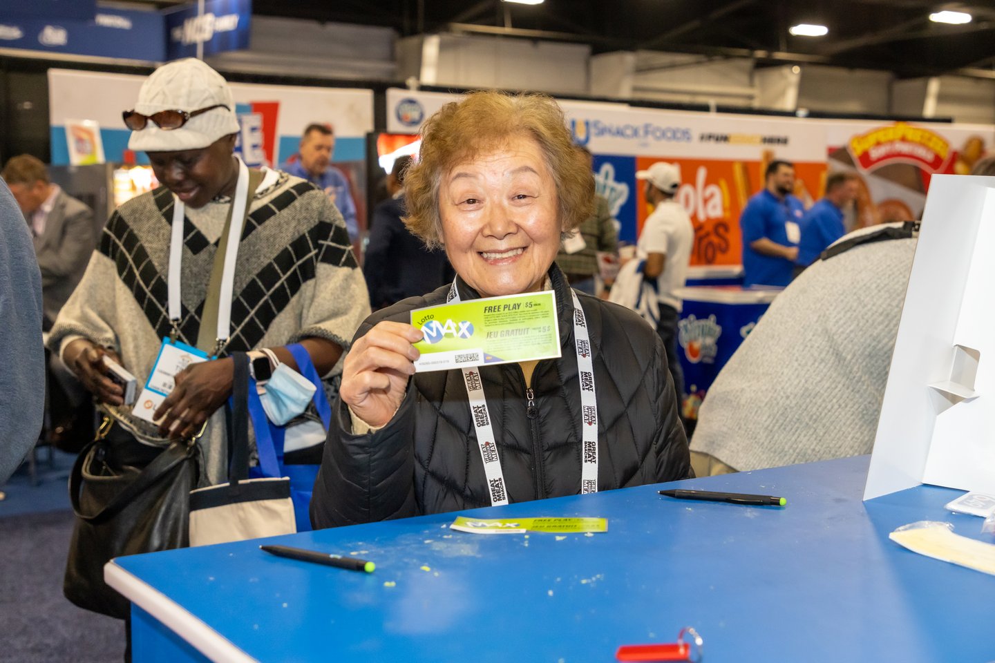 Convenience U 2024 Show Floor Attendee with Lotto Max Ticket