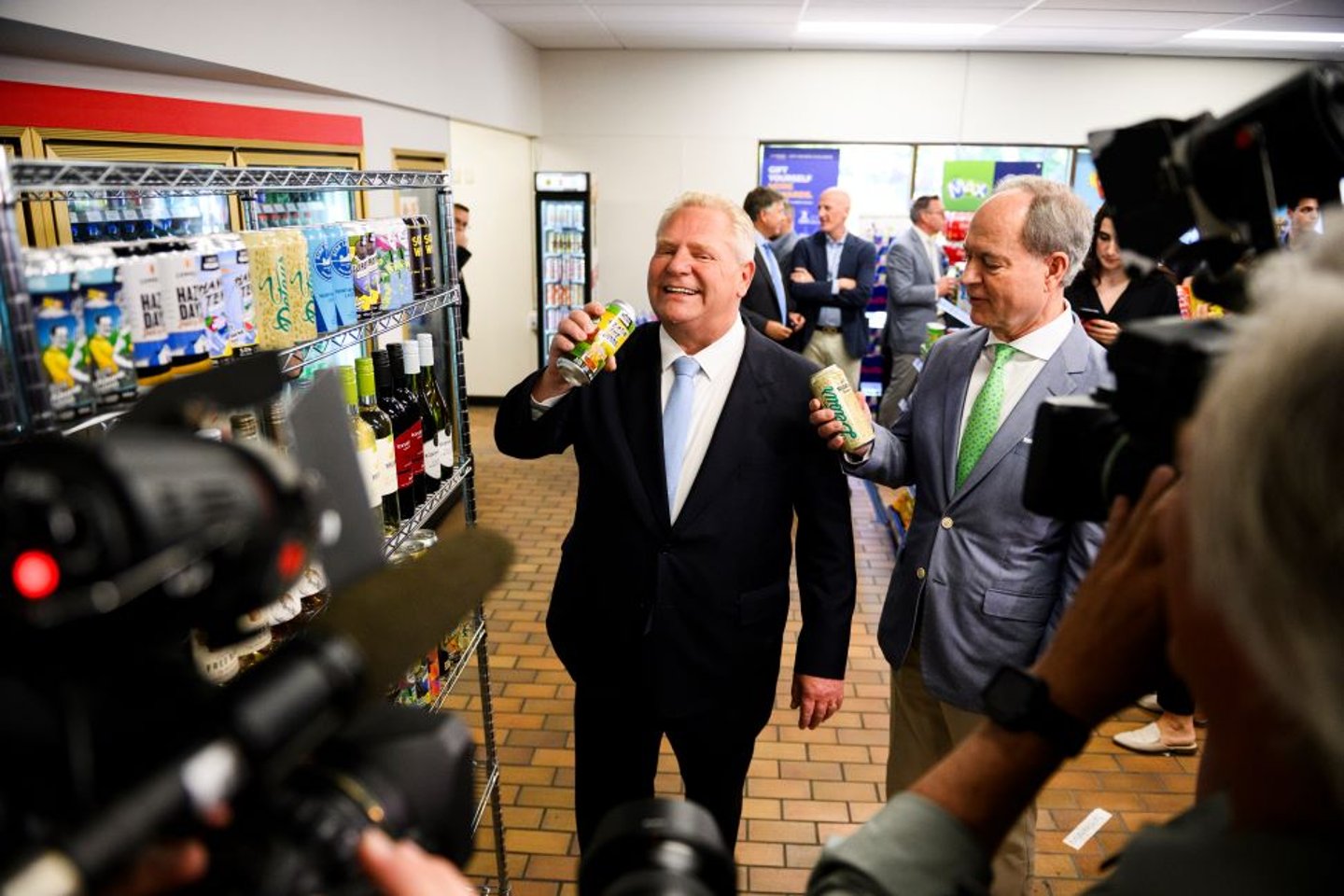 Premier Doug Ford holding a beer