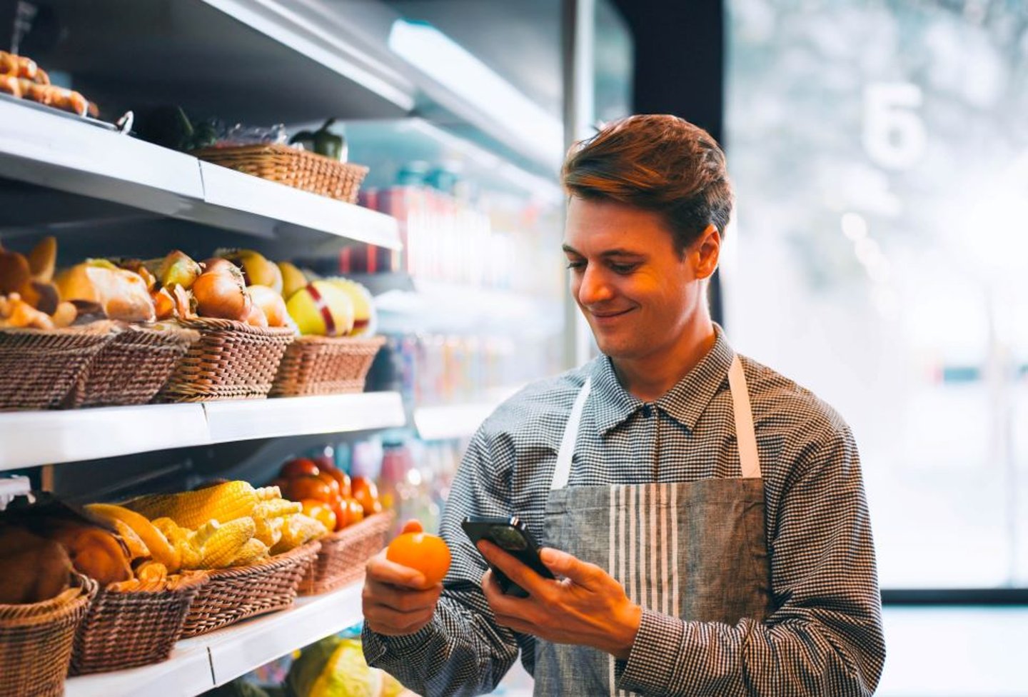 Store Staff working next to food shelves