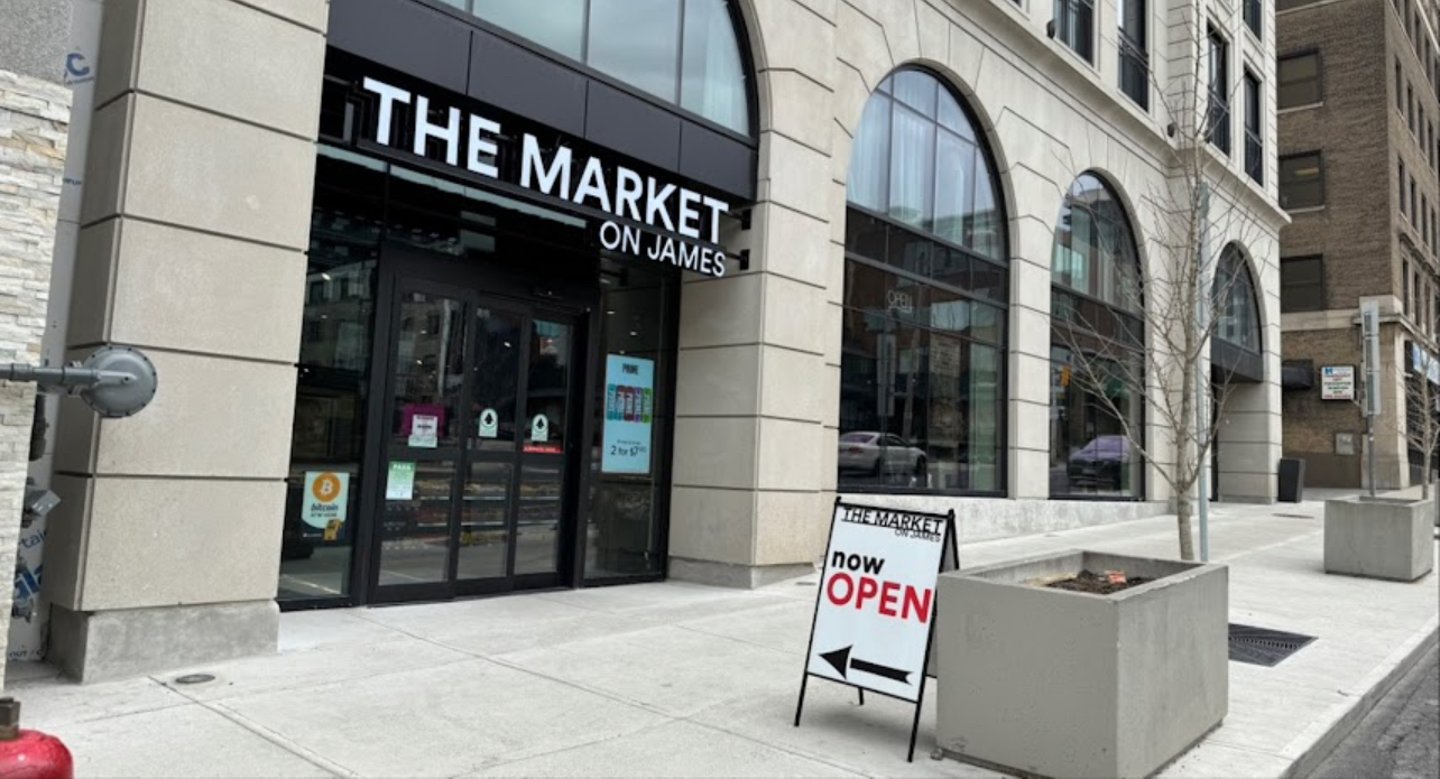 The Market on James open sign